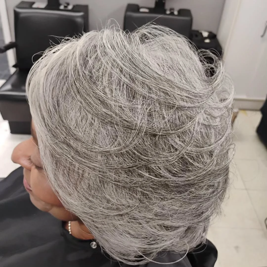 Woman over 60 with tousled beachy bob styled for effortless texture