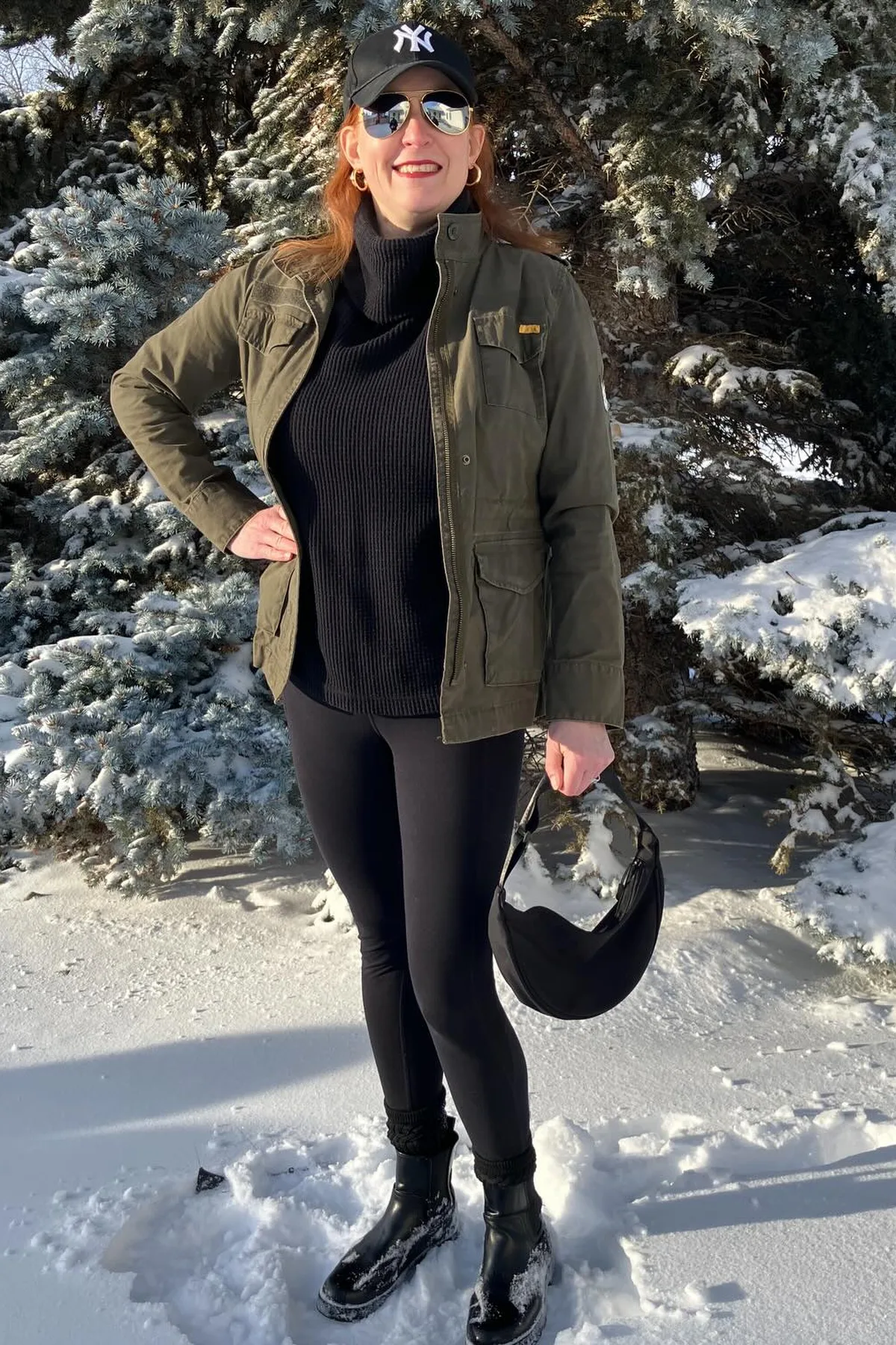 Woman in an olive jacket and black trousers, a forest gothic Halloween costume